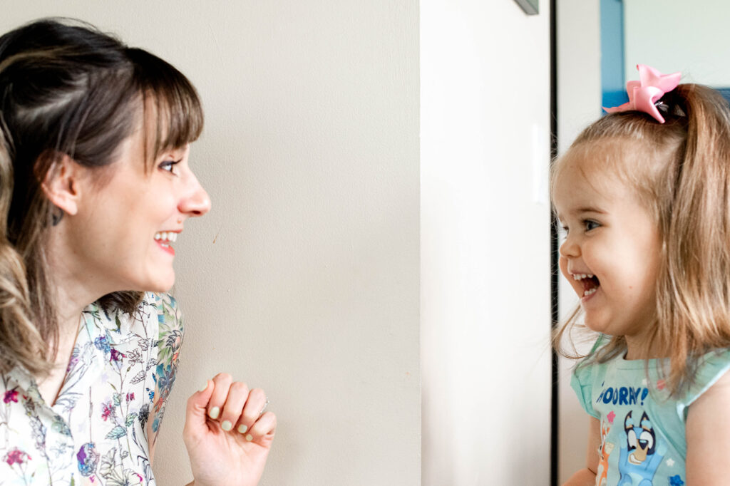 a girl playing during a family photoshoot in Chicago